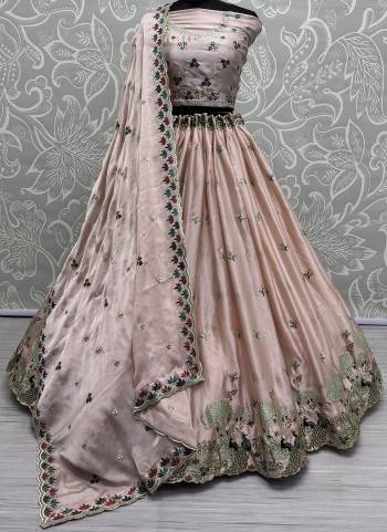 For A Fancy Designer Look,Grab These Lehenga Choli With Dupatta in Fine Colored.These Lehenga And Choli Are Silk And Dupatta Are Fabricated On Chinon Pair.Its Beautified With Designer Double Sequance,Thread Embroidery Work.