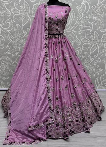 For A Fancy Designer Look,Grab These Lehenga Choli With Dupatta in Fine Colored.These Lehenga And Choli Are Silk And Dupatta Are Fabricated On Chinon Pair.Its Beautified With Designer Double Sequance,Thread Embroidery Work.