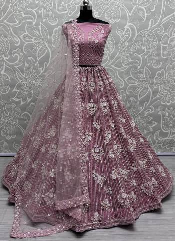 For A Fancy Designer Look,Grab These Lehenga Choli With Dupatta in Fine Colored.These Lehenga And Choli Are Net And Dupatta Are Fabricated On Net Pair.Its Beautified With Designer Sequance,Dori Embroidery,Zarkan Work.