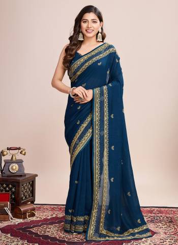 Garb This Partywear Saree Paired With Blouse.This Saree And Blouse Are Vichitra Silk Based Fabric With Designer Embroidery Work. Buy This Pretty Saree Now.