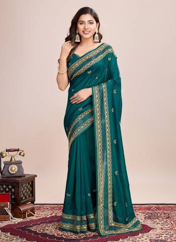 Garb This Partywear Saree Paired With Blouse.This Saree And Blouse Are Vichitra Silk Based Fabric With Designer Embroidery Work. Buy This Pretty Saree Now.