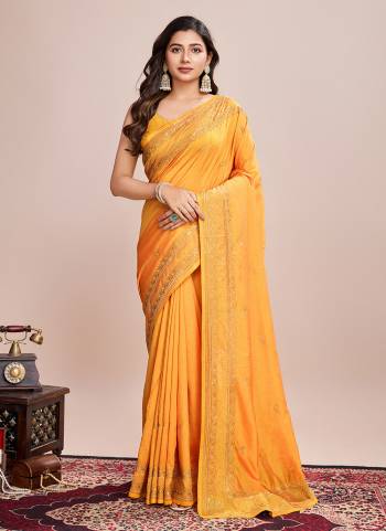 Garb This Partywear Saree Paired With Blouse.This Saree And Blouse Are Vichitra Silk Based Fabric With Designer Embroidery Work. Buy This Pretty Saree Now.