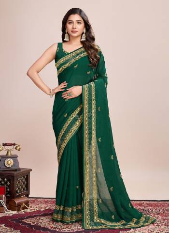 Garb This Partywear Saree Paired With Blouse.This Saree And Blouse Are Vichitra Silk Based Fabric With Designer Embroidery Work. Buy This Pretty Saree Now.