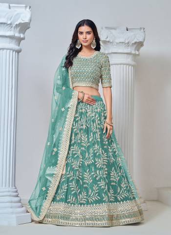 For A Designer Look,Grab These Lehenga Choli in Fine Colored.These Lehenga And Blouse Are Fabricated On Net Pair With Net Dupatta.Its Beautified With Designer Thread,Sequance Embroidery Work.