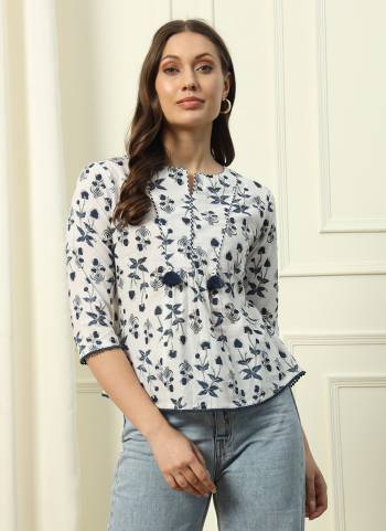 Attrective These Beautiful Looking Readymade Short Top.These Top Fabricated On Cotton.Its Beautified With Designer Floral Printed.