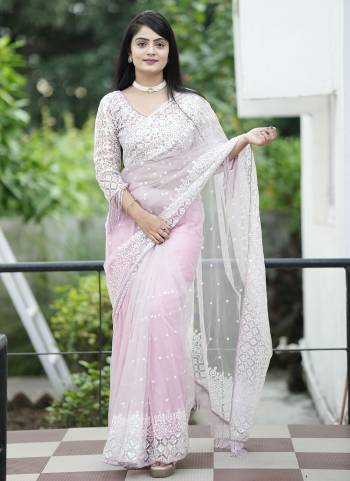 Attrective These Party Wear Saree in Fine Colored.These Saree Are Net And Blouse is Net Fabricated.Its Beautified With Designer Sequance Embroidery Work.