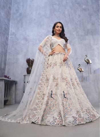 For A Fancy Designer Look,Grab These Lehenga Choli With Dupatta in Fine Colored.These Lehenga And Choli Are Soft Net And Dupatta Are Fabricated On Soft Net Pair.Its Beautified With Heavy Designer Thread,Jari,Sequance Embroidery,Stone Work.