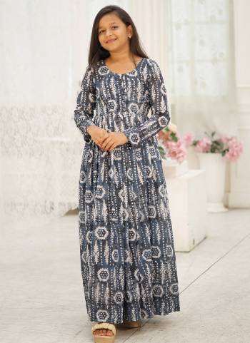 For A Designer Look,Grab These Kidswear Readymade Gown in Fine Colored.These Gown Are Fabricated On Faux Georgette Pair With Cotton Inner.Its Beautified With Digital Printed With Sequance,Jari Embroidery Work.