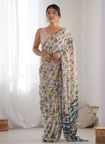 Garb These Party Wear Saree in Fine Colored.These Saree And Blouse is Chinon Fabricated.Its Beautified With Designer Digital Printed With Mirror Cut Work.