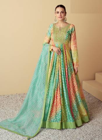 Garb These Party Wear Anarkali Dress in Fine Colored Pair With Dupatta.These Top Are Muslin And Dupatta Are Fabricated On Organza Pair.Its Beautified With Designer Printed With Embroidery Work