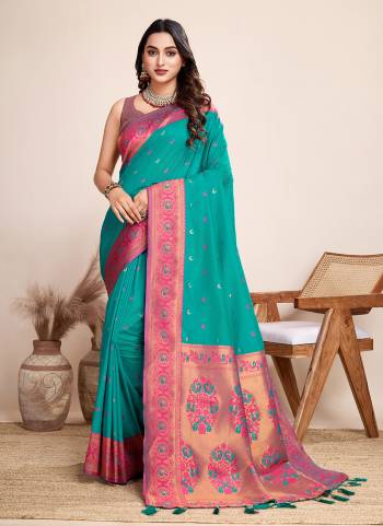 Garb This Partywear Saree Paired With Blouse.This Saree And Blouse Are Jacquard Silk Based Fabric With Heavy Wevon Designer. Buy This Pretty Saree Now.