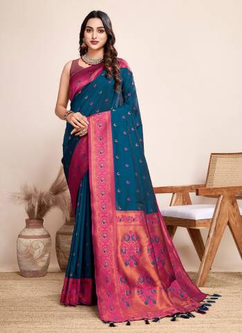 Garb This Partywear Saree Paired With Blouse.This Saree And Blouse Are Jacquard Silk Based Fabric With Heavy Wevon Designer. Buy This Pretty Saree Now.