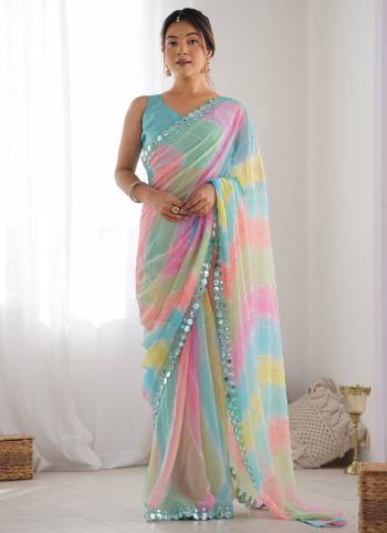 Garb These Party Wear Saree in Fine Colored.These Saree Are Georgette And Blouse is Mono Banglori Fabricated.Its Beautified With Designer Foil Printed With Mirror Cut Work Border.