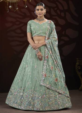 For A Fancy Designer Look,Grab These Lehenga Choli With Dupatta in Fine Colored.These Lehenga And Choli Are Chinon And Dupatta Are Fabricated On Georgette Pair.Its Beautified With Designer Sequance,Thread Embroidery Work With Flower Printed Dupatta.