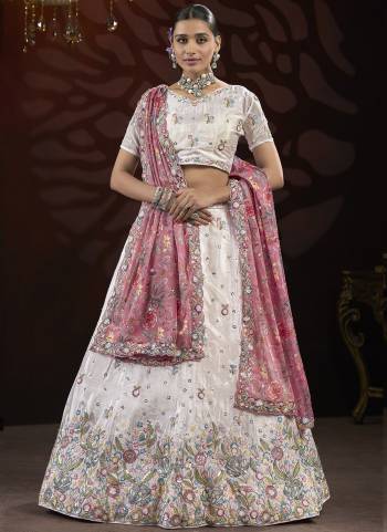 For A Fancy Designer Look,Grab These Lehenga Choli With Dupatta in Fine Colored.These Lehenga And Choli Are Chinon And Dupatta Are Fabricated On Georgette Pair.Its Beautified With Designer Sequance,Thread Embroidery Work With Flower Printed Dupatta.