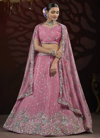 For A Fancy Designer Look,Grab These Lehenga Choli With Dupatta in Fine Colored.These Lehenga And Choli Are Chinon And Dupatta Are Fabricated On Georgette Pair.Its Beautified With Designer Sequance,Thread Embroidery Work With Flower Printed Dupatta.