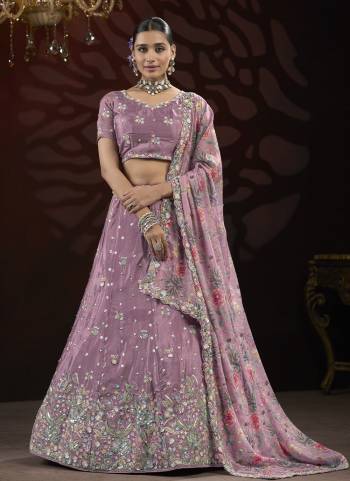 For A Fancy Designer Look,Grab These Lehenga Choli With Dupatta in Fine Colored.These Lehenga And Choli Are Chinon And Dupatta Are Fabricated On Georgette Pair.Its Beautified With Designer Sequance,Thread Embroidery Work With Flower Printed Dupatta.