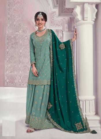 Garb These Party Wear Designer Sharara Suits in Fine Colored Pair With Dupatta.These Top Are Chinon And Dupatta Are Fabricated On Chinon Pair With Chinon Bottom.Its Beautified With Heavy Designer Embroidery Work