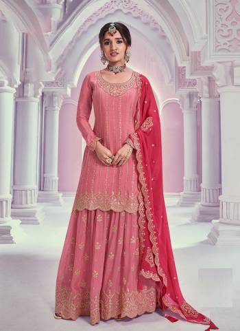 Garb These Party Wear Designer Sharara Suits in Fine Colored Pair With Dupatta.These Top Are Chinon And Dupatta Are Fabricated On Chinon Pair With Chinon Bottom.Its Beautified With Heavy Designer Embroidery Work