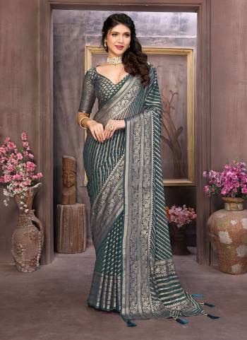 Looking These Party Wear Saree in Fine Colored.These Saree Are Moss Brasso And Blouse is Fabricated On Moss Brasso Pair.Its Beautified With Brasso Cutting Designer Work.