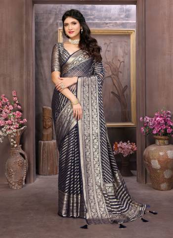 Looking These Party Wear Saree in Fine Colored.These Saree Are Moss Brasso And Blouse is Fabricated On Moss Brasso Pair.Its Beautified With Brasso Cutting Designer Work.