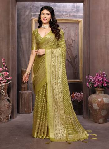 Looking These Party Wear Saree in Fine Colored.These Saree Are Moss Brasso And Blouse is Fabricated On Moss Brasso Pair.Its Beautified With Brasso Cutting Designer Work.