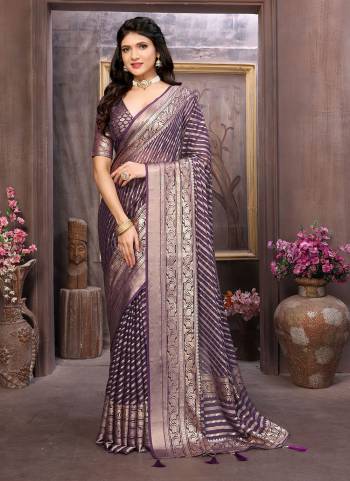 Looking These Party Wear Saree in Fine Colored.These Saree Are Moss Brasso And Blouse is Fabricated On Moss Brasso Pair.Its Beautified With Brasso Cutting Designer Work.