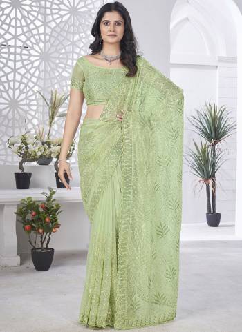 Looking These Party Wear Saree in Fine Colored.These Saree Are Tissue Net And Blouse is Tissue Net Fabricated.Its Beautified With Designer Multy Thread,Sequance Embroidery Cut Work.