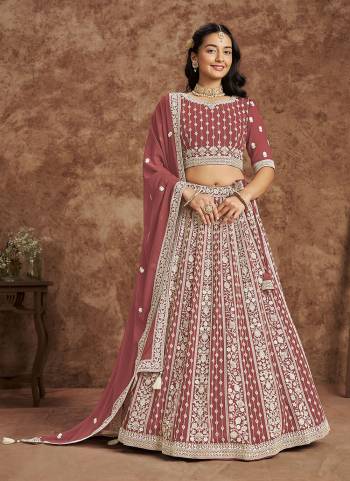 For A Designer Look,Grab These Lehenga Choli in Fine Colored.These Lehenga And Blouse Are Fabricated On Faux Georgette Pair With Faux Georgette Dupatta.Its Beautified With Designer Embroidery Work.