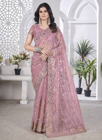 Attrective These Party Wear Saree in Fine Colored.These Saree Are Tissue Net And Blouse is Tissue Net Fabricated.Its Beautified With Designer Thread,Duble Sequance Embroidery Work.