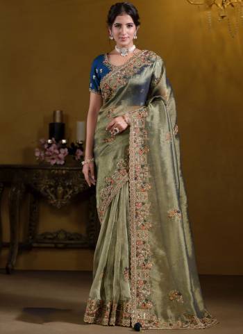 Look Attrective These Designer Party Wear Saree in Fine Colored.These Saree Are Georgette,Zari Organza And Blouse Raw Silk is Fabricated.Its Beautified Heavy Desiger Embroidery,Khatli Work.