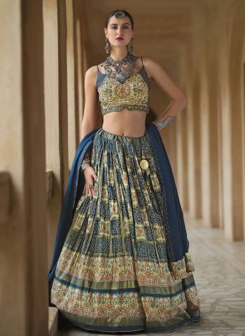 For A Designer Look,Grab These Lehenga Choli in Fine Colored.These Lehenga And Blouse Are Fabricated On Smooth Silk Pair With Georgette Dupatta.Its Beautified With Designer Foil Printed With Embroidery Work.