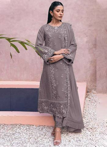 Looking These Designer Suit in Fine Colored Pair With Bottom And Dupatta.These Top Are Georgette And Dupatta Are Fabricated On Nazmin Pair With Santoon Bottom.Its Beautified With Santoon Inner.Its Beautified With Heavy Designer Embroidery Work.