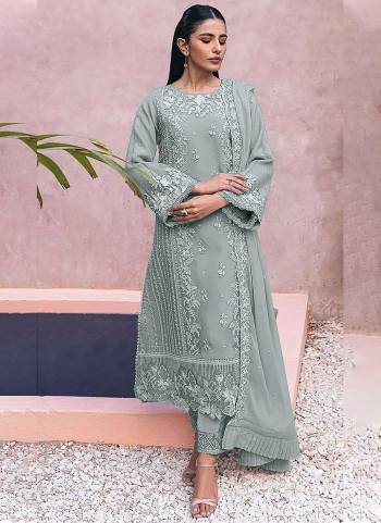 Looking These Designer Suit in Fine Colored Pair With Bottom And Dupatta.These Top Are Georgette And Dupatta Are Fabricated On Nazmin Pair With Santoon Bottom.Its Beautified With Santoon Inner.Its Beautified With Heavy Designer Embroidery Work.