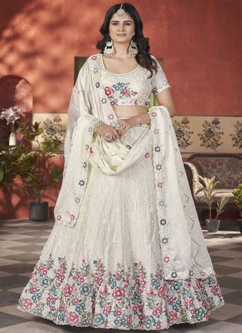 For A Fancy Designer Look,Grab These Lehenga Choli With Dupatta in Fine Colored.These Lehenga And Choli Are Chinon And Dupatta Are Fabricated On Georgette Pair.Its Beautified With Designer Sequance,Multy Thread Embroidery Work.