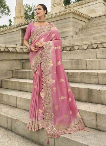 Attrective These Party Wear Saree in Fine Colored.These Saree Are Viscose Tissue Silk And Blouse is Fabricated On Raw Silk.Its Beautified With Wevon Butti Designer With Sequance Embroidery,Stone,Cut Work .