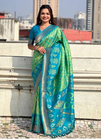 Garb These Party Wear Saree in Fine Colored.These Saree And Blouse is Fabricated On Patola Silk.Its Beautified With Weaving Meenakari Ikkat Designer.