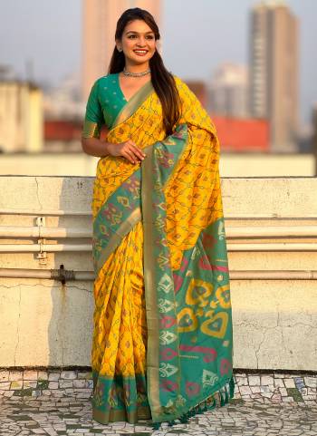 Garb These Party Wear Saree in Fine Colored.These Saree And Blouse is Fabricated On Patola Silk.Its Beautified With Weaving Meenakari Ikkat Designer.