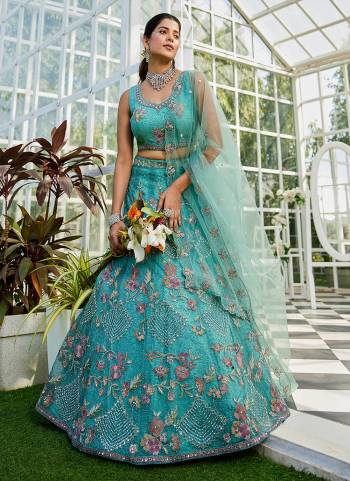 Attrective Looking This Partywear Fine Color Fancy Heavy Designer Choli And Lahenga Fabriced On Net And Dupatta Net In Fabricated Beautified With Attrective Designer Heavy Thread,Coding Embroidery Work. Buy Now.