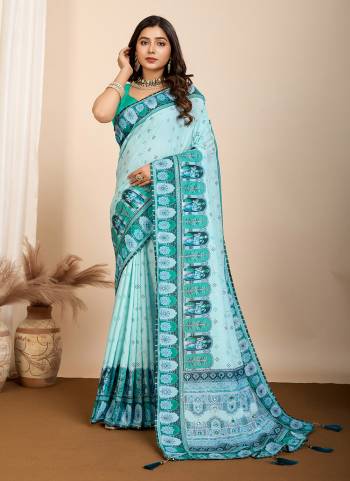 Garb This Partywear Saree Paired With Blouse.This Saree And Blouse Are Muslin Cotton Based Fabric With Designer Digital Printed. Buy This Pretty Saree Now.
