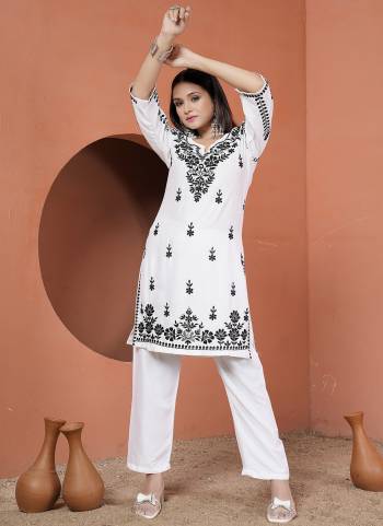 Grab These Beautiful Looking Readymade Kurti With Bottom.These Kurti And Bottom is Fabricated On Rayon.Its Beautified With Designer Chikankari Embroidery Work.