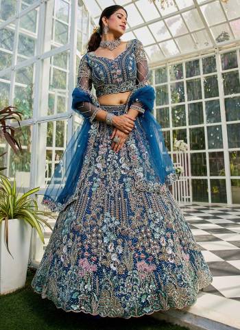 Attrective Looking This Partywear Fine Color Fancy Heavy Designer Choli And Lahenga Fabriced On Net And Dupatta Net In Fabricated Beautified With Attrective Designer Heavy Sequance,Thread,Coding Embroidery Work. Buy Now.