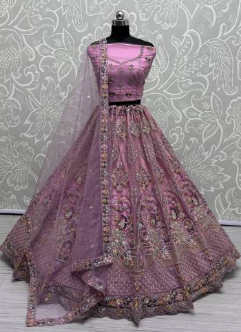 For A Fancy Designer Look,Grab These Lehenga Choli With Dupatta in Fine Colored.These Lehenga And Choli Are Net And Dupatta Are Fabricated On Net Pair.Its Beautified With Designer Sequance,Multy Thread,Dori Embroidery,Zarkan Work.