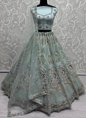 For A Fancy Designer Look,Grab These Lehenga Choli With Dupatta in Fine Colored.These Lehenga And Choli Are Net And Dupatta Are Fabricated On Net Pair.Its Beautified With Designer Sequance,Multy Thread,Dori Embroidery,Zarkan Work.
