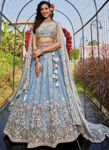 Attrective Looking This Partywear Fine Color Fancy Heavy Designer Choli And Lahenga Fabriced On Net And Dupatta Net In Fabricated Beautified With Attrective Designer Heavy Thread,Sequance Embroidery Work. Buy Now.