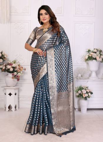 Looking These Party Wear Saree in Fine Colored.These Saree And Blouse is Fabricated On Organza.Its Beautified With Wevon Jari Border Designer.