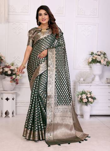 Looking These Party Wear Saree in Fine Colored.These Saree And Blouse is Fabricated On Organza.Its Beautified With Wevon Jari Border Designer.