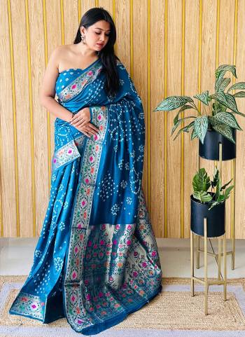 Garb These Party Wear Saree in Fine Colored.These Saree And Blouse is Fabricated On Silk.Its Beautified With Wevon Paithani Designer With Original Bandhej Disigner.