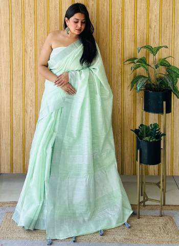 Garb These Fastive Wear Saree in Fine Colored.These Saree And Blouse is Fabricated On Linen.Its Beautified With Wevon Designer.