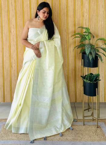 Garb These Fastive Wear Saree in Fine Colored.These Saree And Blouse is Fabricated On Linen.Its Beautified With Wevon Designer.